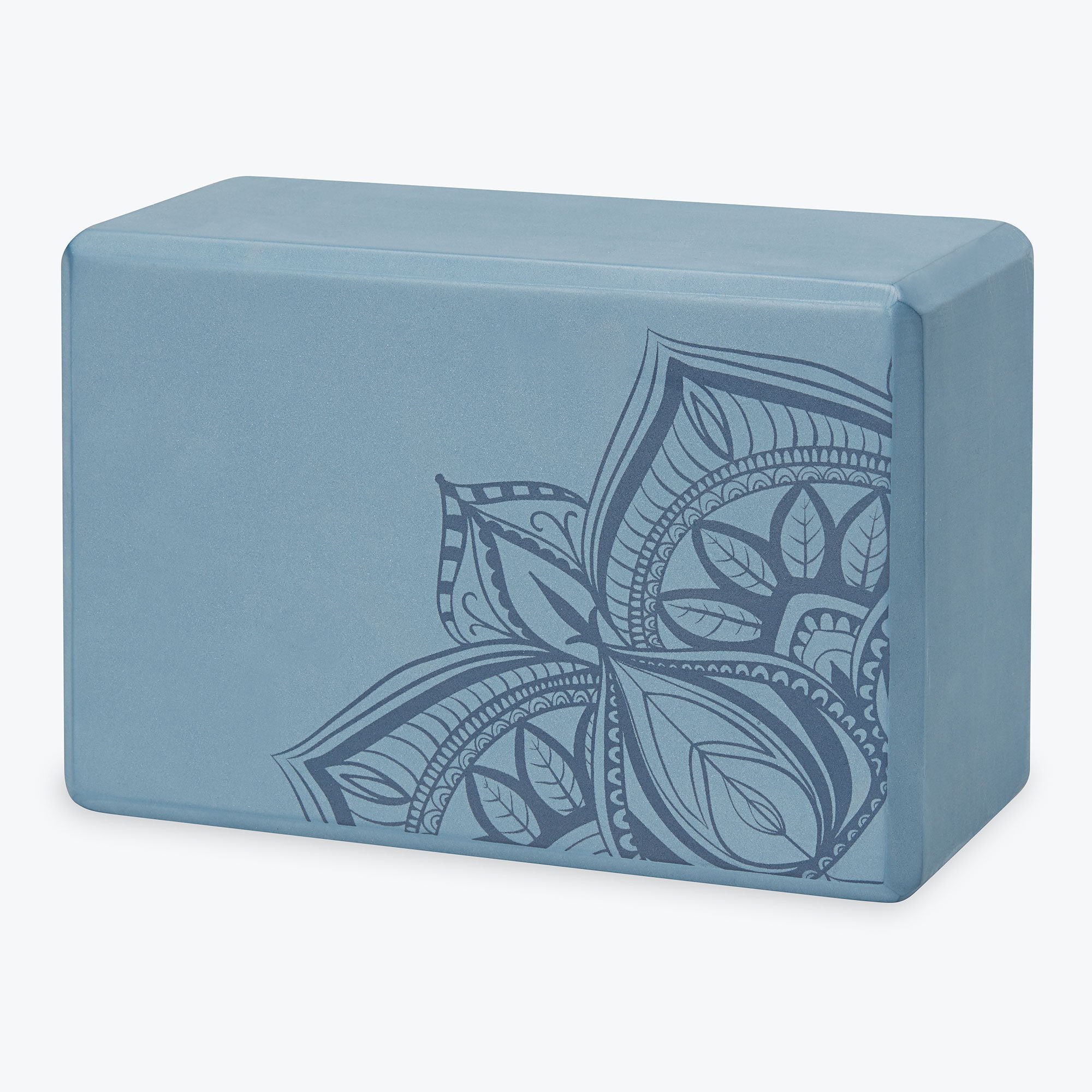 Blue yoga block with floral design