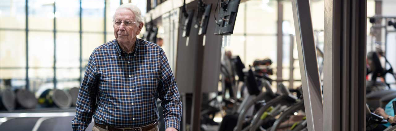Interior of wellness center with fitness equipment and open workout space