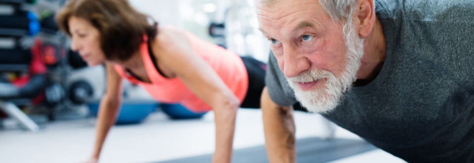 Two people doing push ups